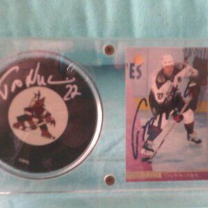 Teppo Numminen #27 SIGNED Phoenix Coyotes Game Hockey Puck 1997 Upper Deck #122